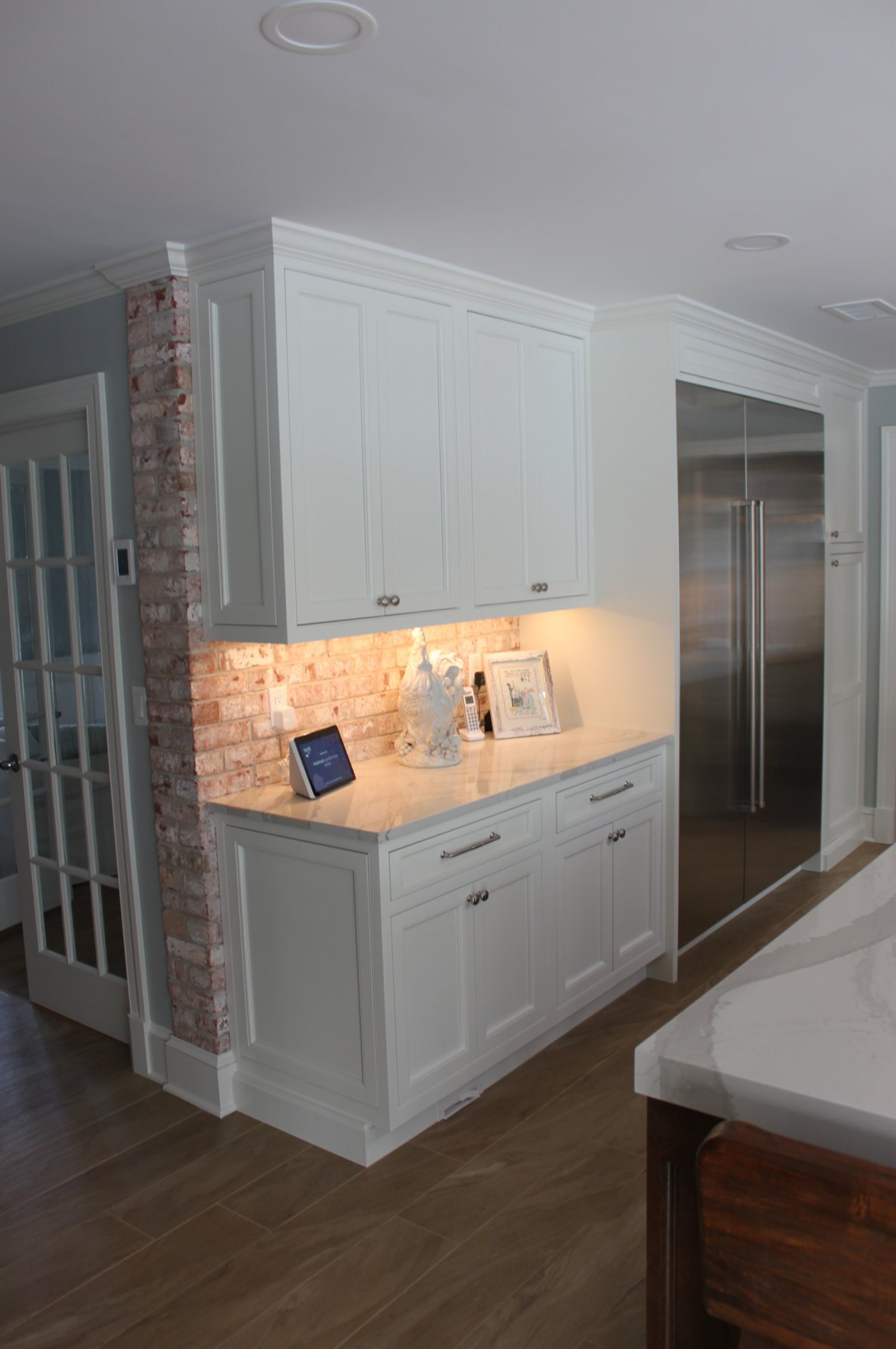 Wilton kitchen remodel — custom cabinetry and integrated appliances