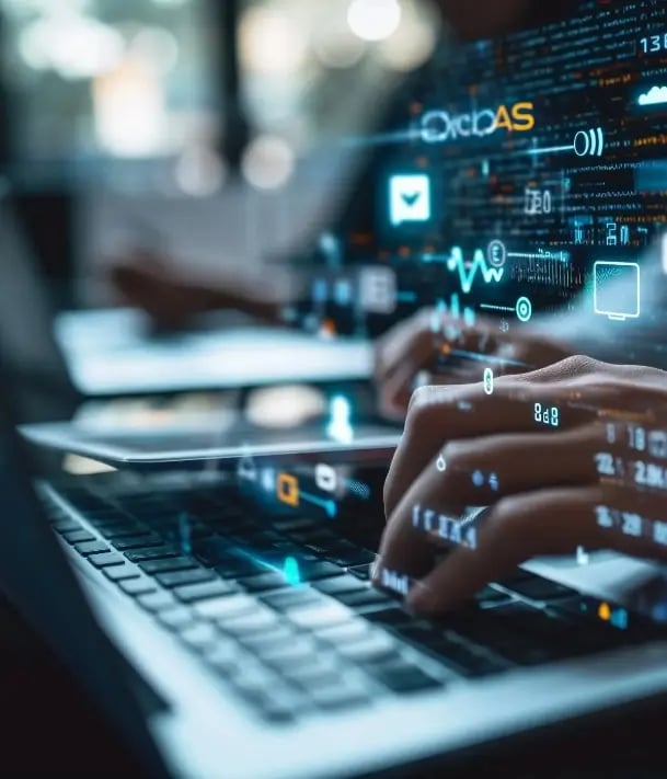 Hands on keyboard with digital interface visuals representing Generative Engine Optimization using AI and search data