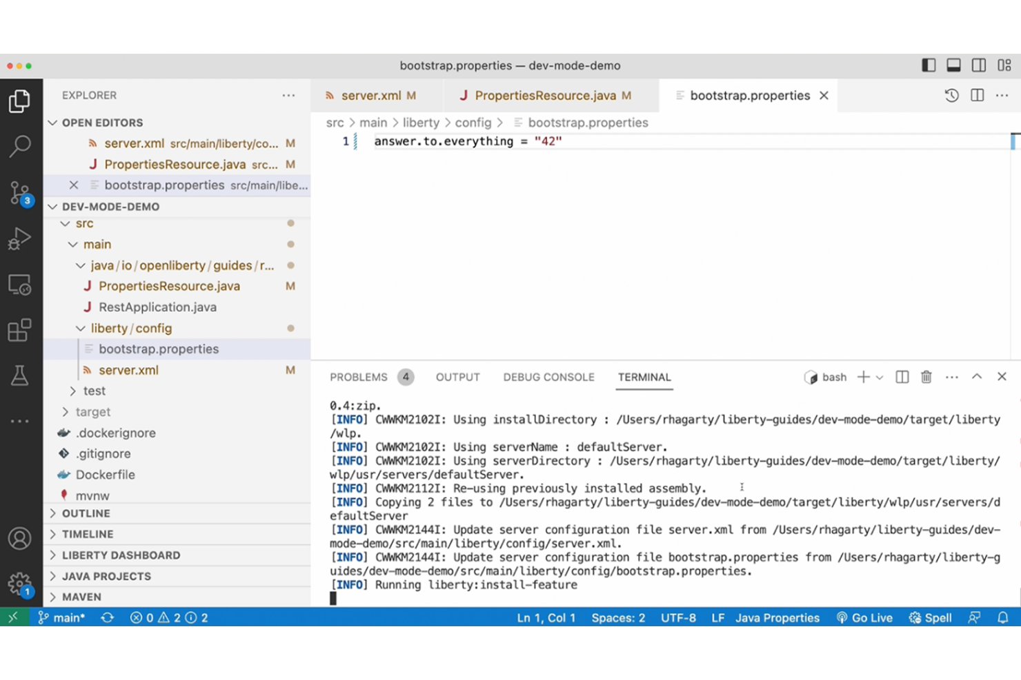 VS Code editor showing bootstrap.properties file and Liberty dev mode terminal logs.