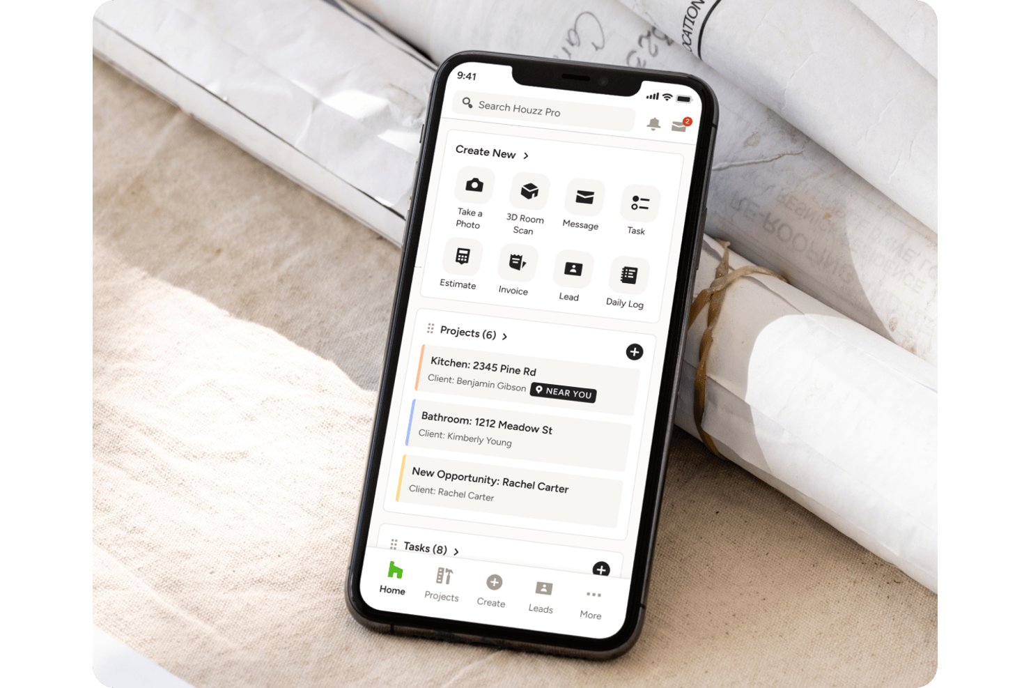Houzz Pros mobilapp som visar projektlista, verktyg för att snabbt skapa innehåll och navigering.