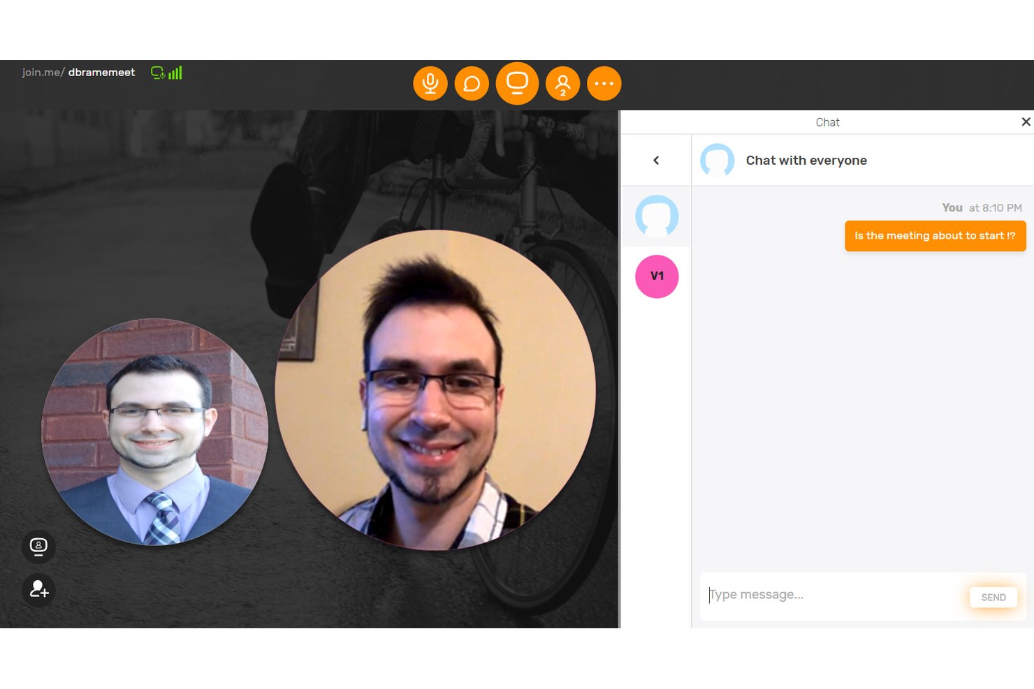 join.me video call interface with two participants and a live group chat panel.