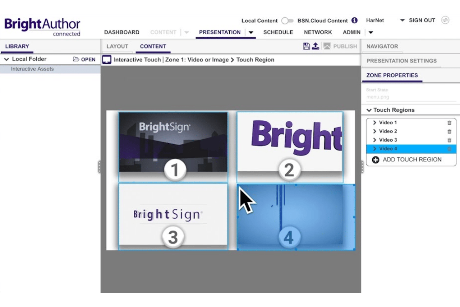 BrightAuthor Connected-interface met vier interactieve aanraakgebieden die aan videocontentzones zijn gekoppeld.