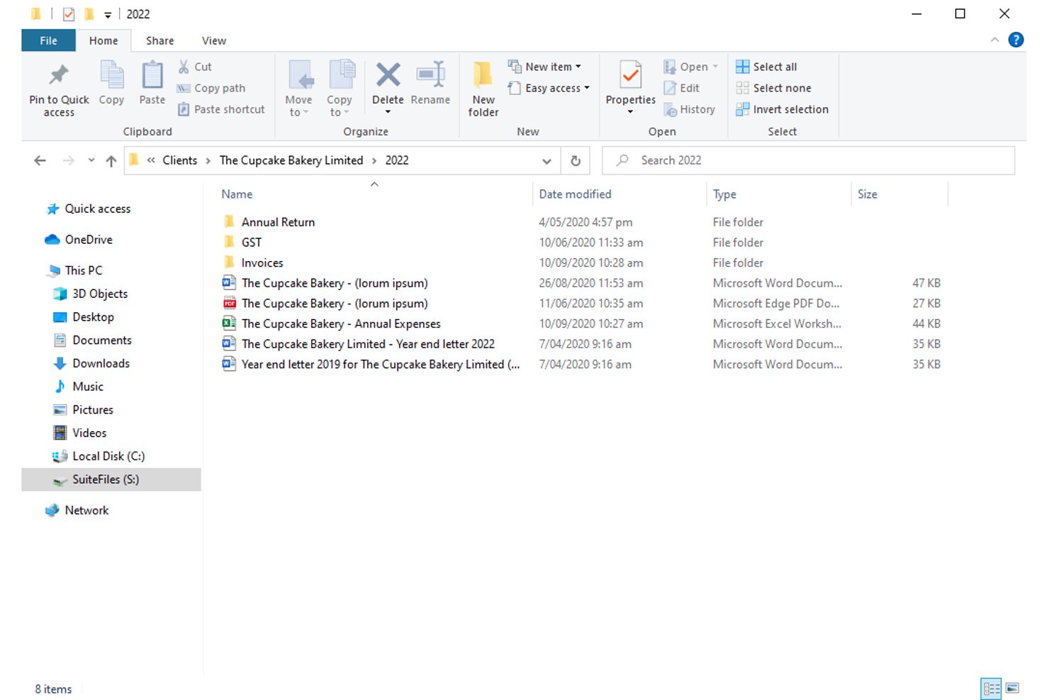 SuiteFiles Windows Explorer view showing client folders and documents for 2022.