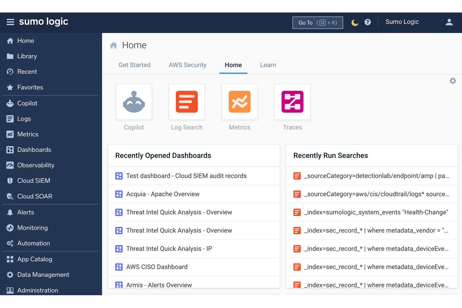 Sumo Logic home screen showing dashboards, log search, metrics, and traces icons.