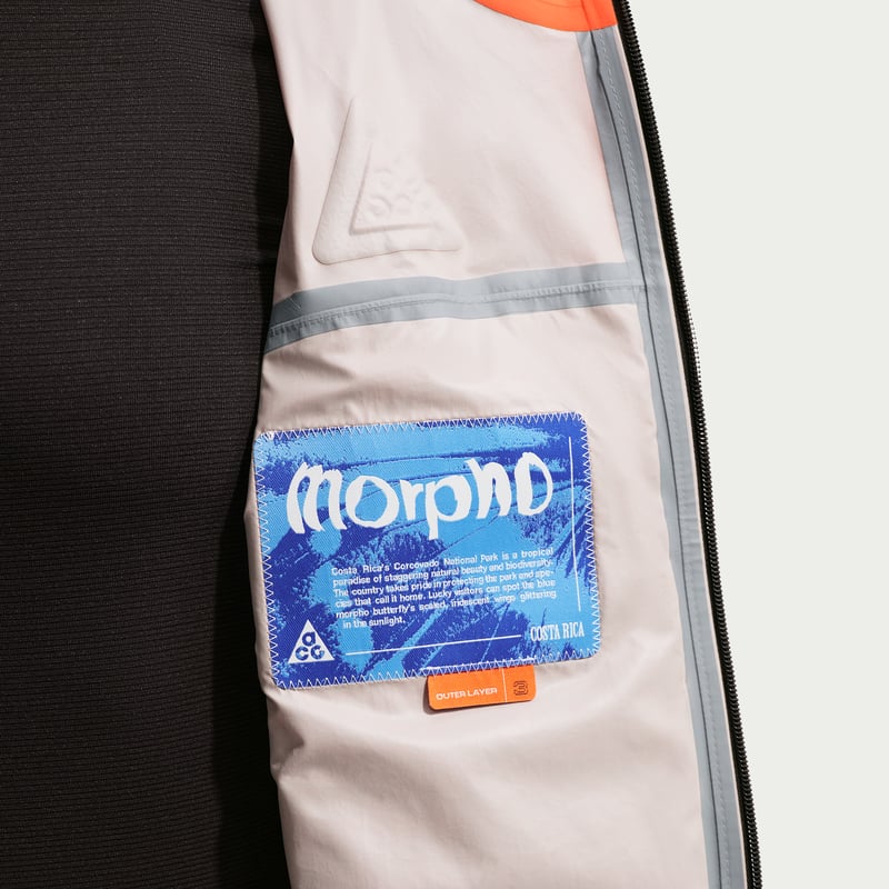 Nike ACG "Morpho" Storm-FIT ADV Rain Jakke "Safety Orange & Vivid Purple" | Dame | | 07 | SPORTSHOWROOM