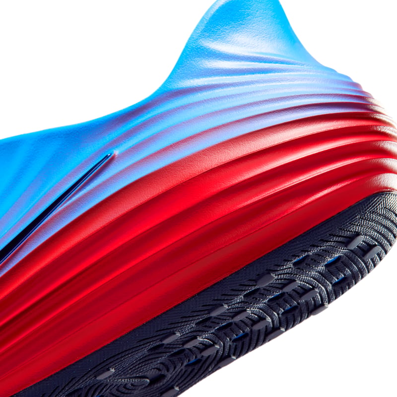 Nike ReactX Rejuven8 sneakers "Action Red & Light Photo Blue" | Dames | Sportstyle | 08 | SPORTSHOWROOM