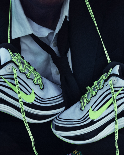 Nike Vomero Plus x Distance Laufschuhe "White & Volt" | Herren | Laufen | 05 | SPORTSHOWROOM