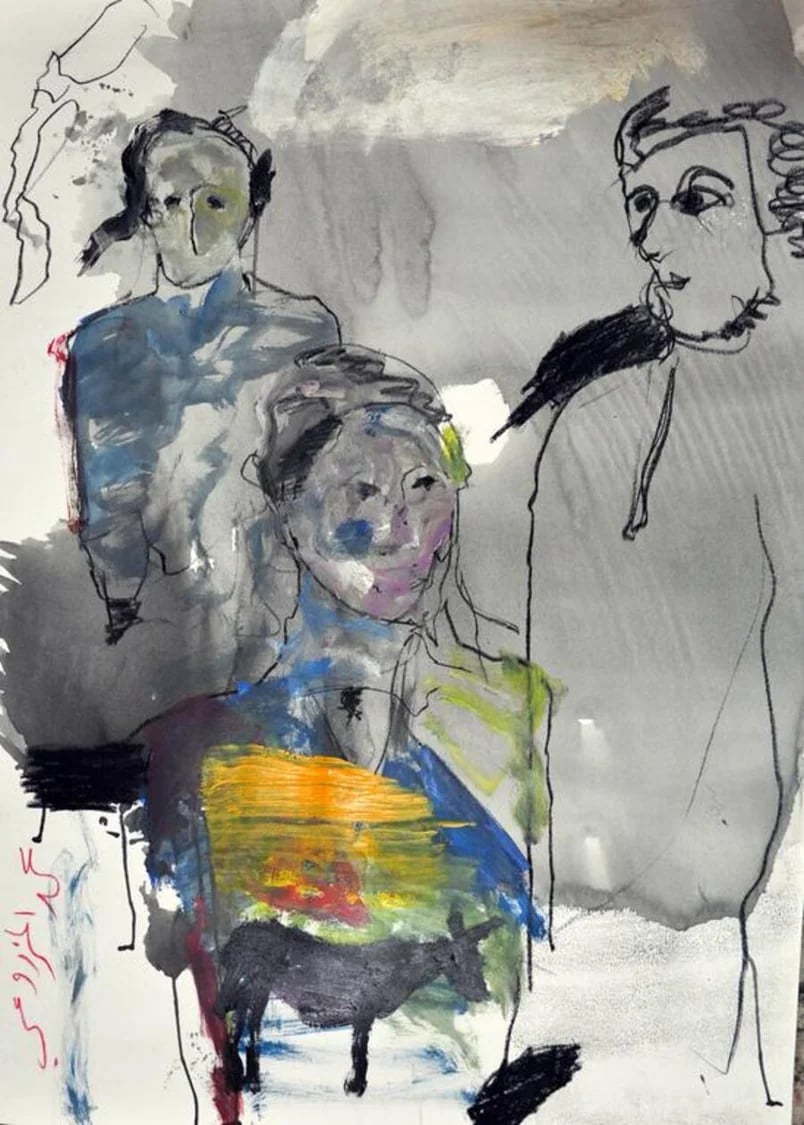 Emirati artist Mohamed Al Mazrouei with his paintings