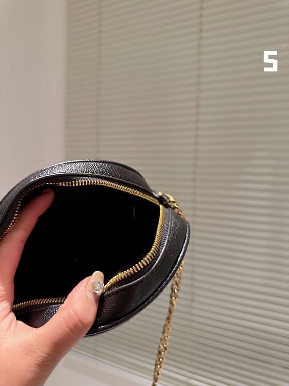 SAINT LAURENT VINYLE ROUND CAMERA BAG IN CHEVRON QUILTED GRAIN DE POUDRE EMBOSSED LEATHER 18CM 104361GF071000