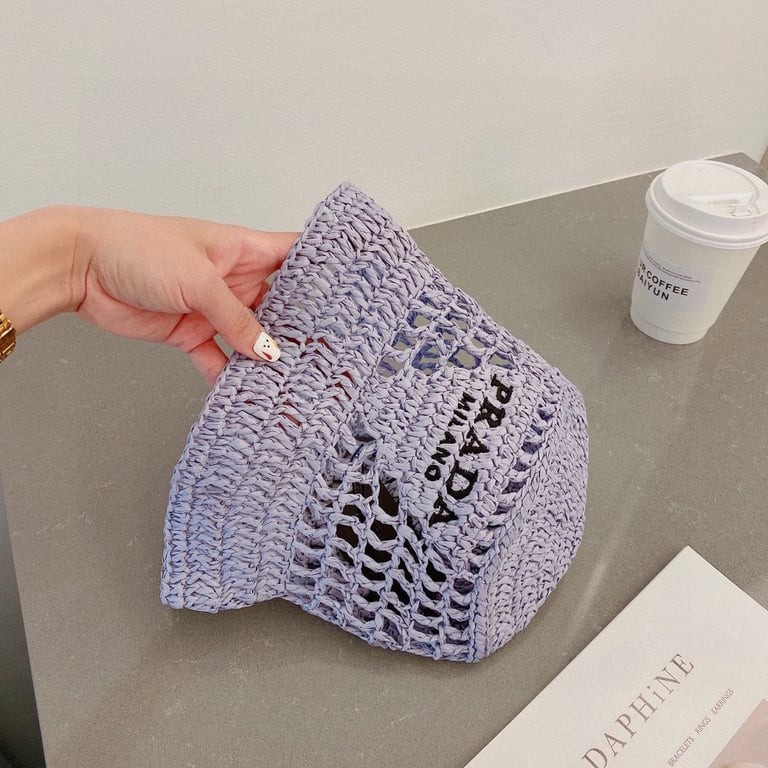 PRADA RAFFIA BUCKET HAT LILY 1HC1372A2TF027J