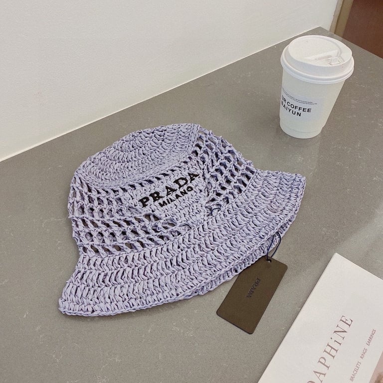 PRADA RAFFIA BUCKET HAT LILY 1HC1372A2TF027J