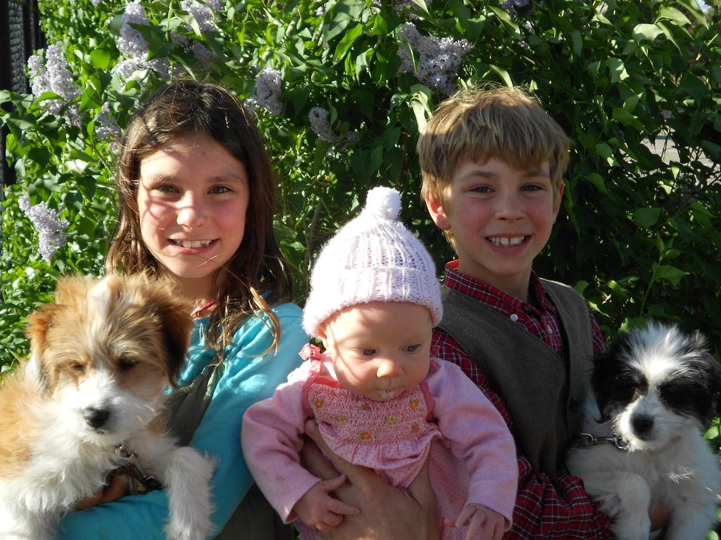 Our Children - Eliana, Adiel, and Silas with their puppies, Lassie and Snow