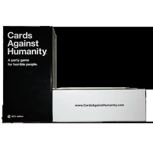 Cards Against Humanity - Party Game for Horrible People, INTL Edition cover