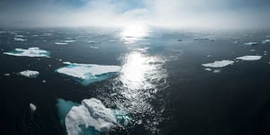 天氣 氣候landscape and aerial photography of icebergs on body of water during daytime