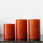 Candela d'arredo, lavorata in 2 tonalità di arancio e cera interna nera