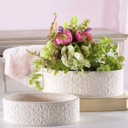 Set 2 vasi ovali in ceramica lucida con decori in rilievo