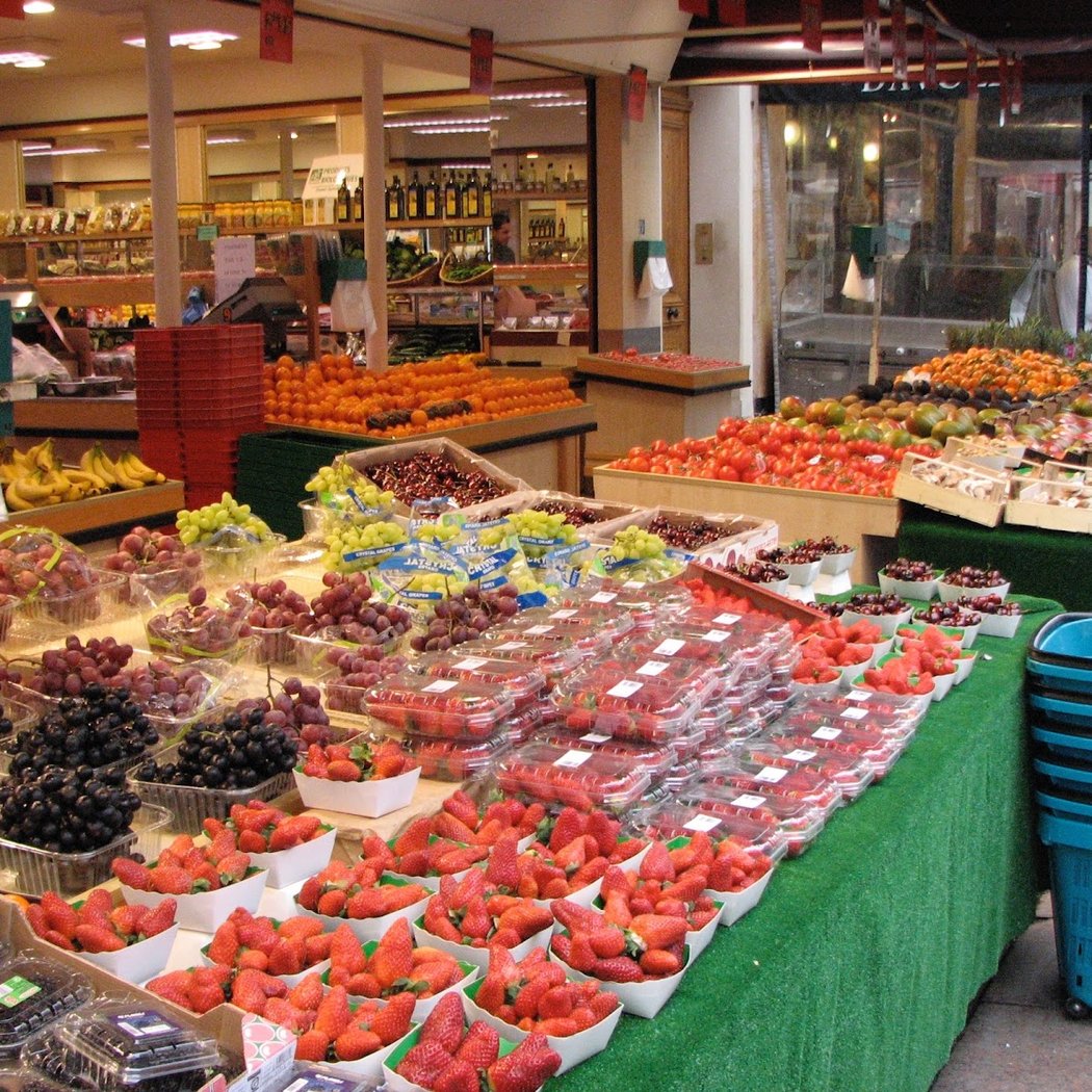 Browse Fresh Finds at Rue Cler Market 1