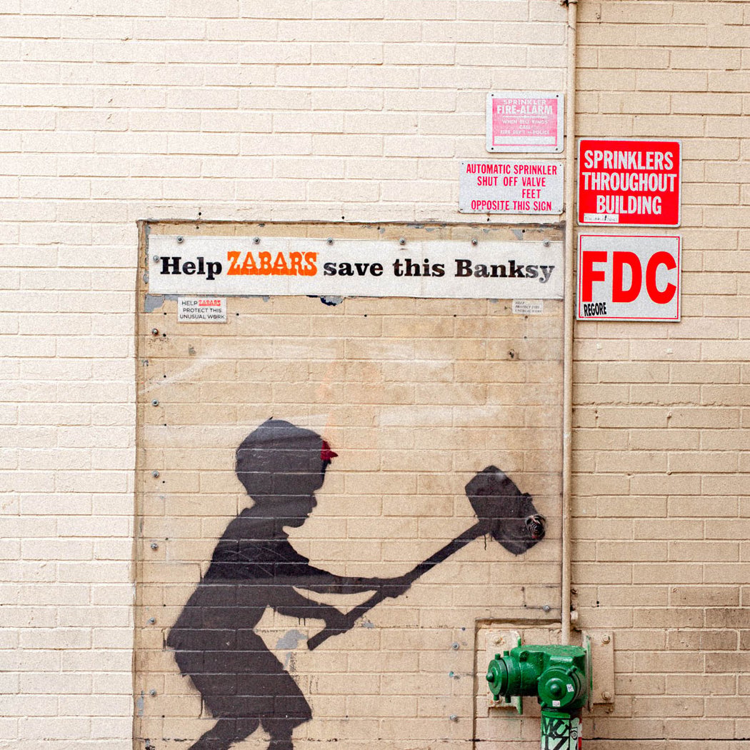 Banksy "Hammer Boy" Mural 1