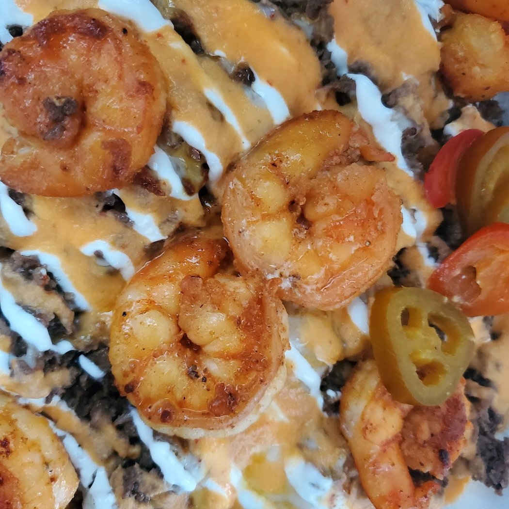 The Saucy Hut (Food Truck) 1