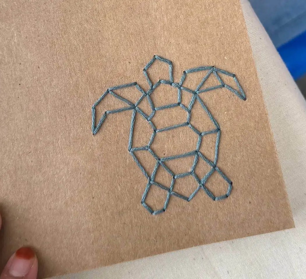 Rhythms of the Stitch: Hand Embroidery on Notebook 1
