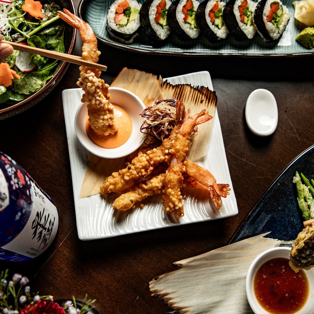 1/2 Priced Sushi Rolls & Cocktails Happy Hour