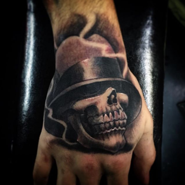 Blacksuit Tattoo 2