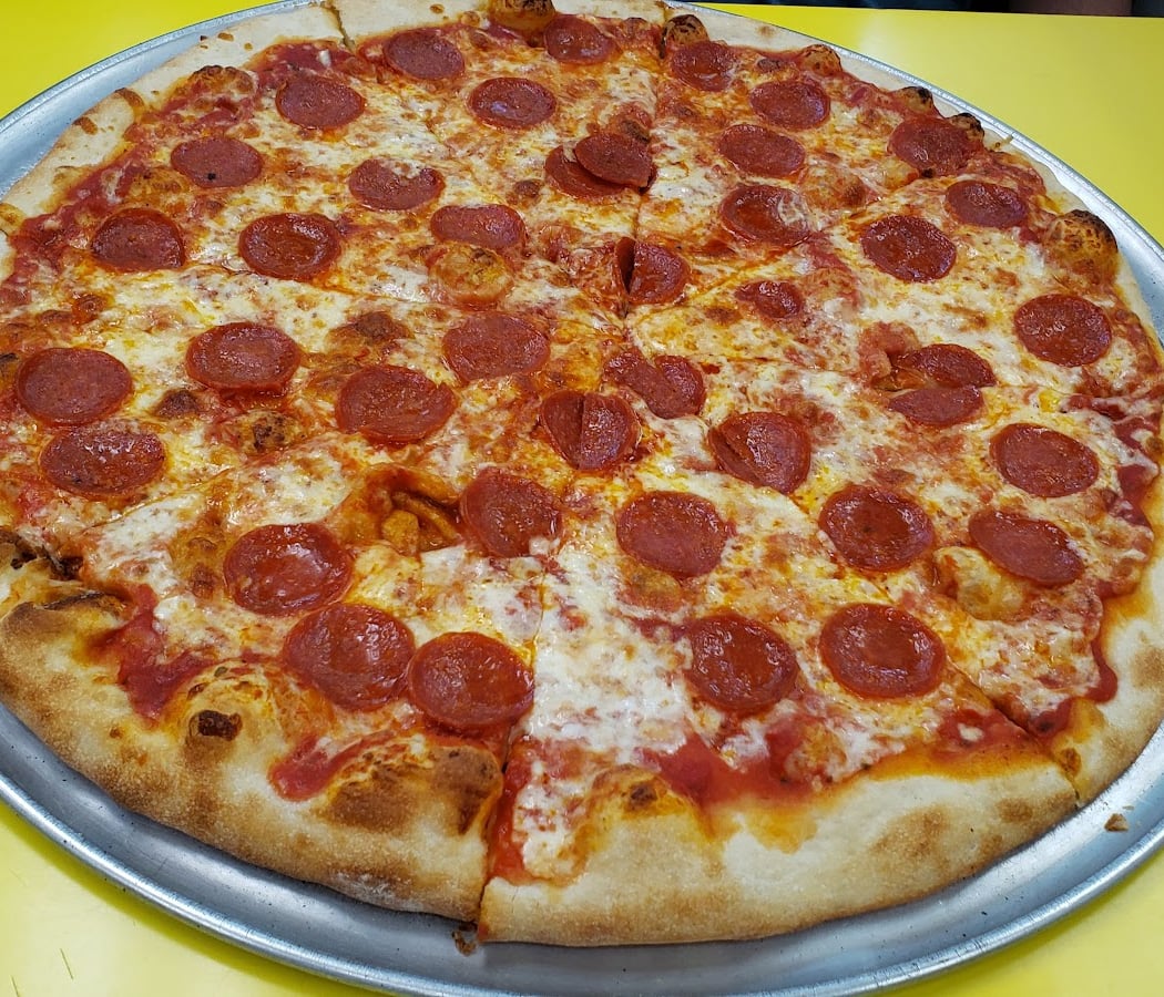 X-tra Cheese Pizzeria 1