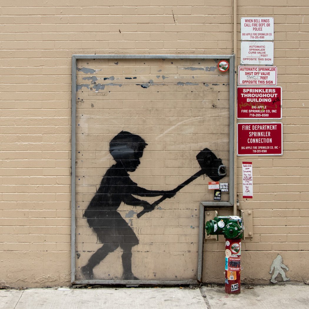 Banksy "Hammer Boy" Mural 5