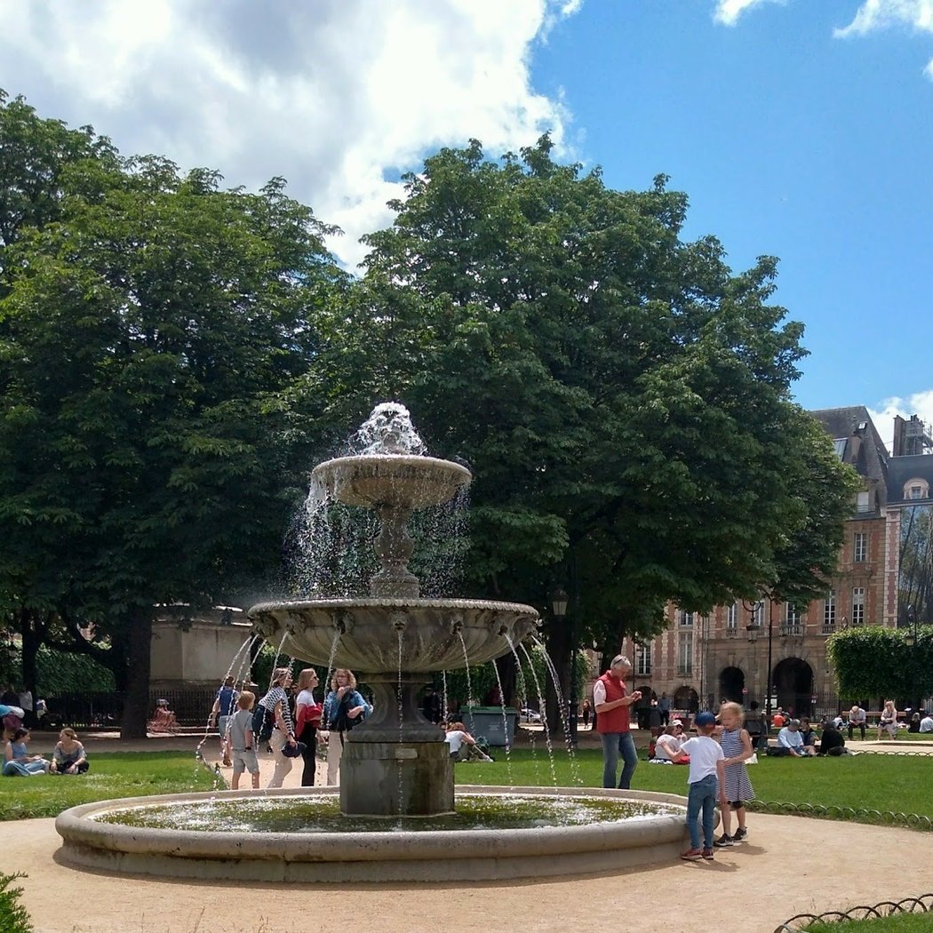 Take in the Beauty of Place des Vosges 1