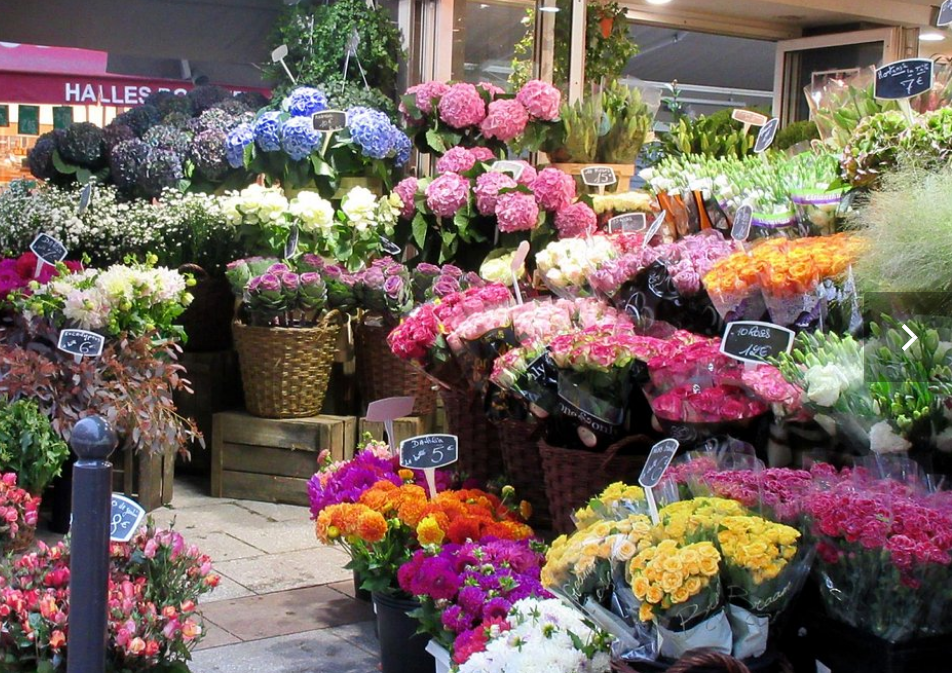 Browse Fresh Finds at Rue Cler Market 2