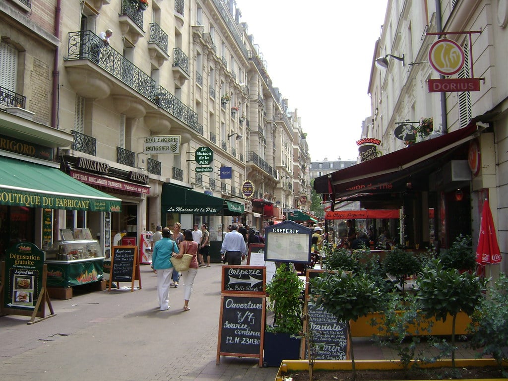 Experience the Buzz of Rue Daguerre 1