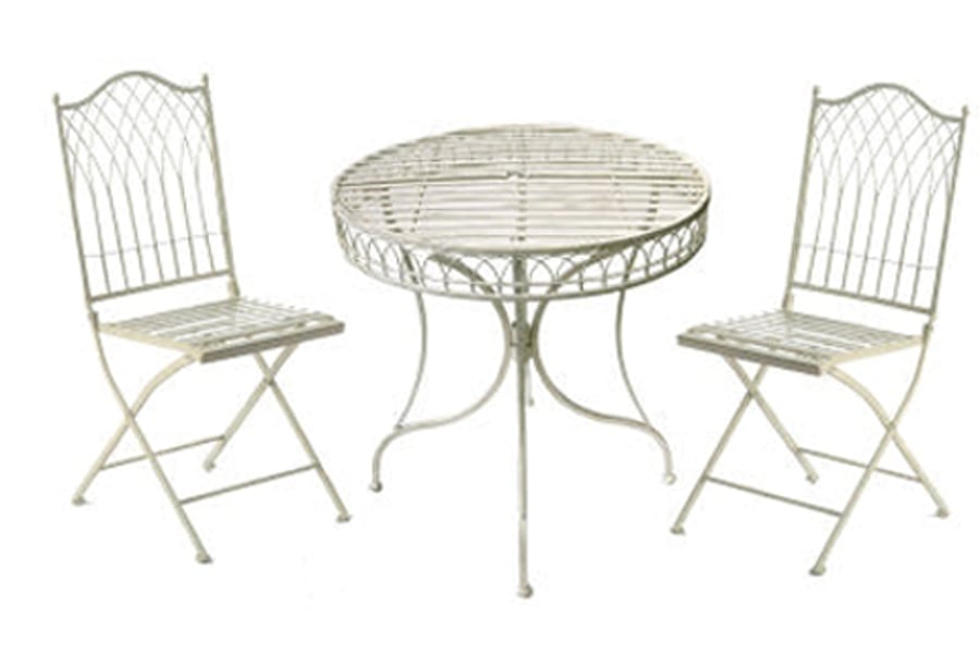 Hampton cream three-piece metal bistro set in a small UK garden with herbaceous border