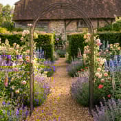 Streamline Moderne Metal Garden Arch in Umber - lifestyle