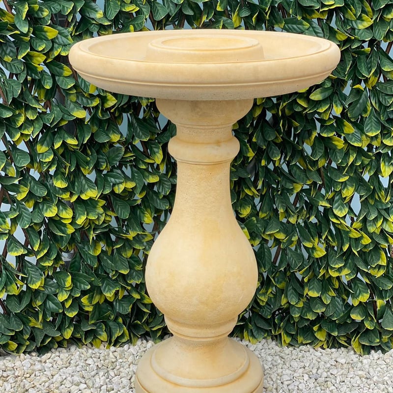 Fosse cast stone bird bath with a frost-proof sandstone-effect finish