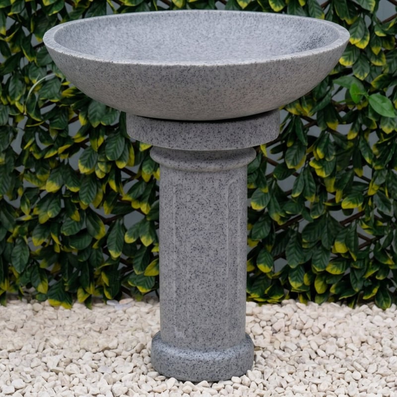 Round grey marble resin bird bath for year-round garden use
