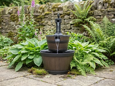 Aged Bowls tiered cascade garden water feature spilling between stone bowls