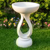 Contemporary White Bird Bath in a Garden Setting