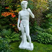 David Garden Ornament in Lush Garden Setting