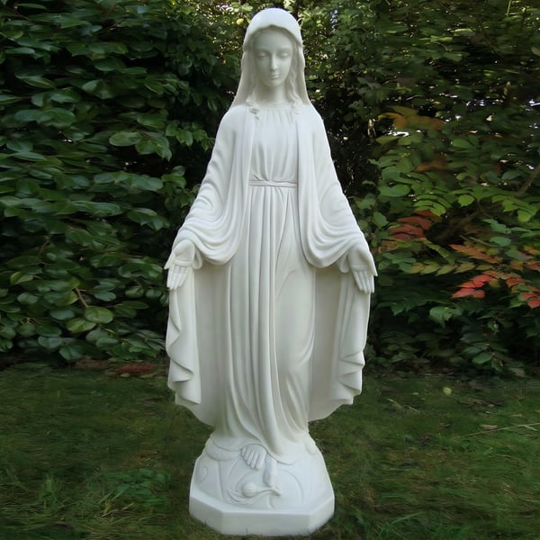 Large Mary religious garden statue in a garden setting