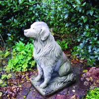 Stone golden retriever garden statue