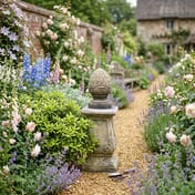 Fir Cone Stone Garden Finial in an English Cottage Garden Setting