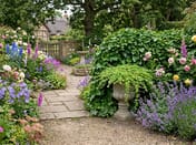 Vienna Classic Stone Garden Vase in Cottage Garden Setting