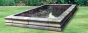 Straight and Corner Stone Pool Sections assembled as water feature
