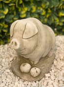 Pig with Apples Garden Ornament in Stone — close-up detail view