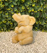 Sitting Elephant Stone Garden Ornament in Sandstone - close up view