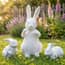 Family of Rabbits Garden Ornament Set in White Cottage Garden Setting