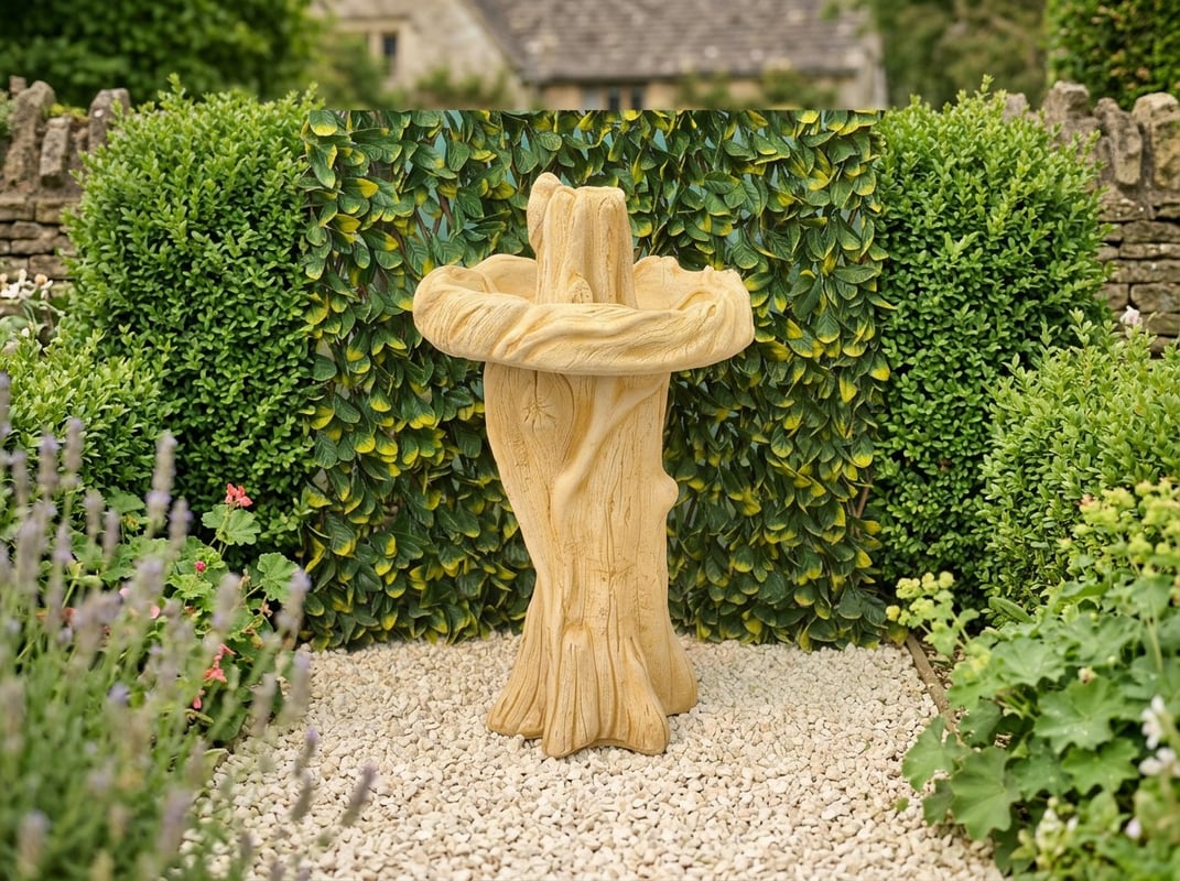 Blue Tit sandstone bird bath in a UK garden border buying guide
