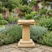 Egton Birdbath in Sandstone in a cottage garden setting