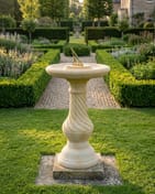 Georgian Sundial in Sandstone in a formal English garden setting
