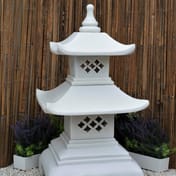 2 Tier Pagoda Garden Ornament in White - studio view with bamboo backdrop